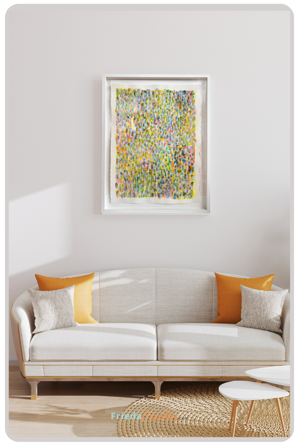 "Taking Up Space", a large original watercolor painting by Frieda displayed above a neutral sofa in a living room. Framed abstract watercolor art in multicolor, 30 by 22 inches, available at Frieda Creates.